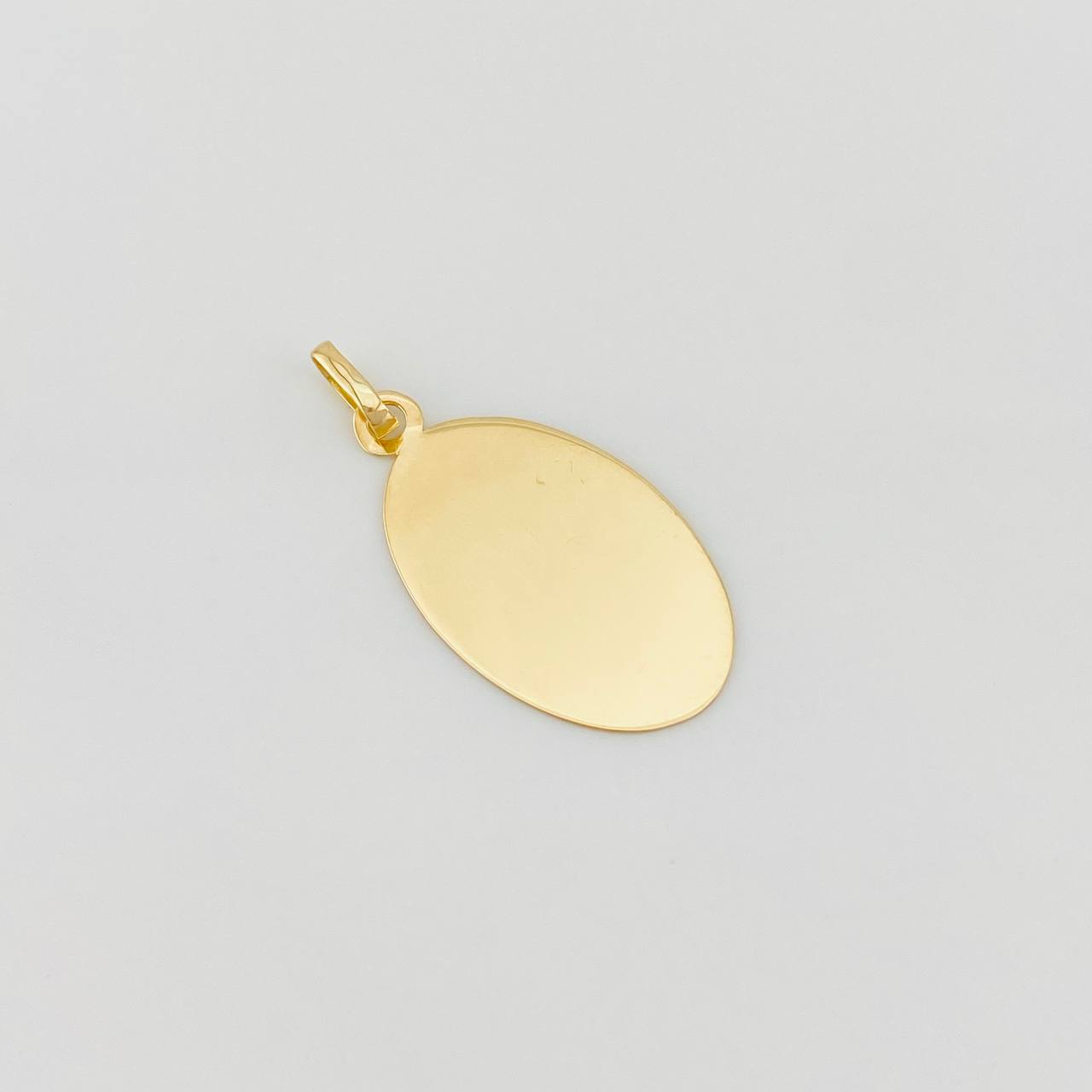 Dije Placa Ovalada 0.9g / 1 in Oro Amarillo 18K