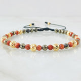 Pulsera Negra Triada Lluviosa 1.4gr / Oro Amarillo 18K  (A.C)