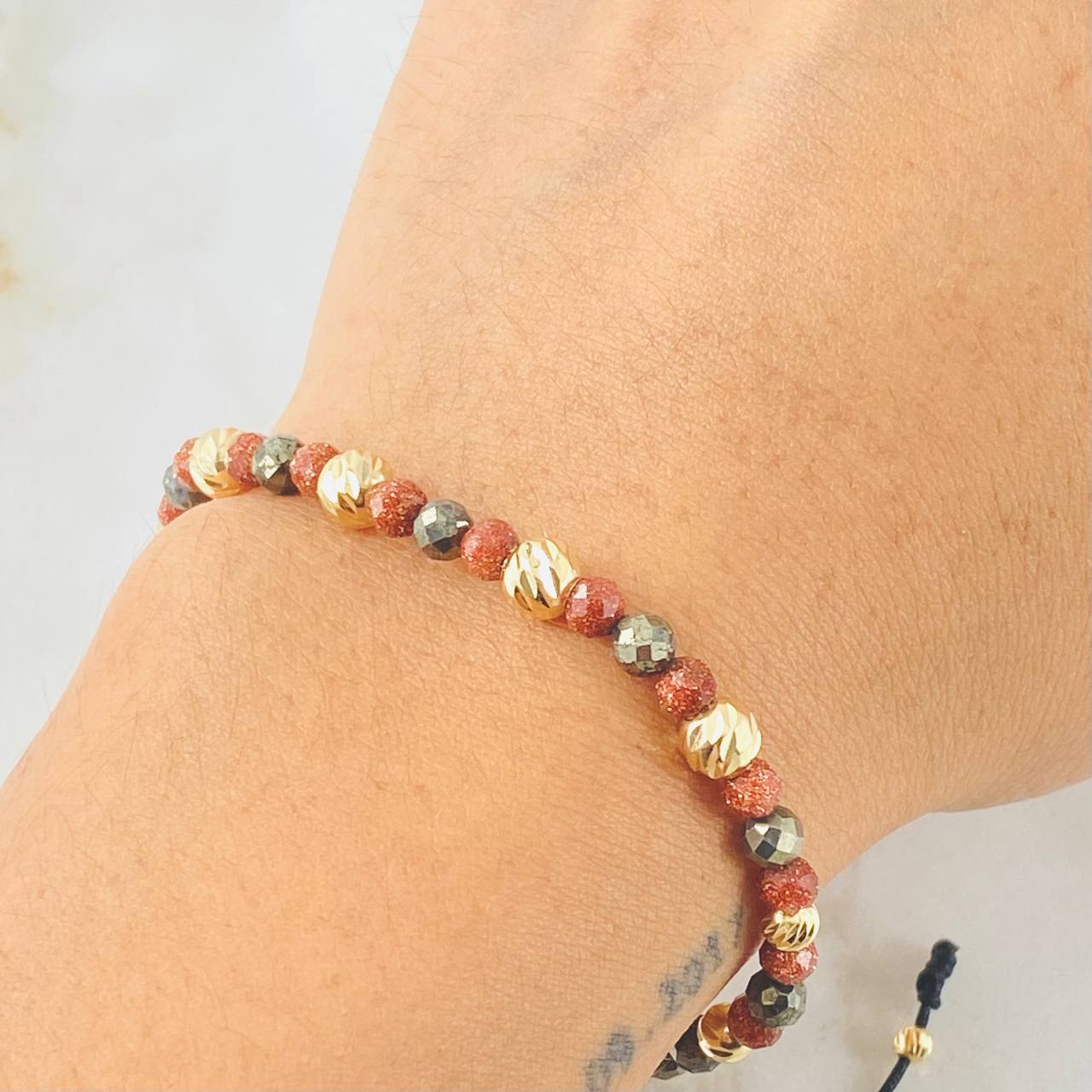 Pulsera Negra Triada Lluviosa 1.4gr / Oro Amarillo 18K  (A.C)