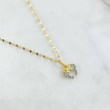 Set Cadena Flor Espejo 0.9gr / 45cm + Dije Oreja Ratón 0.5gr / 1.4gr / Circones Azules Oro 18K (Oferta)