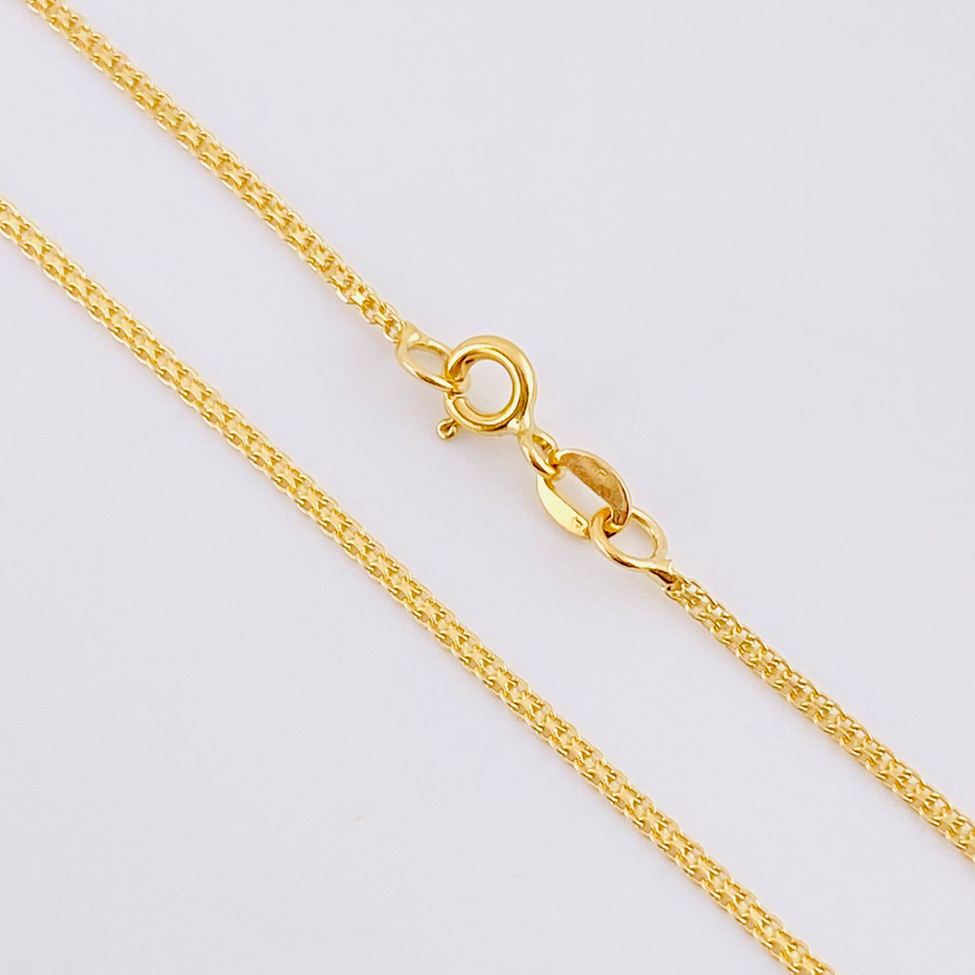 Cadena China 2.55g / 45cm / 1.4mm Oro Amarillo 18K