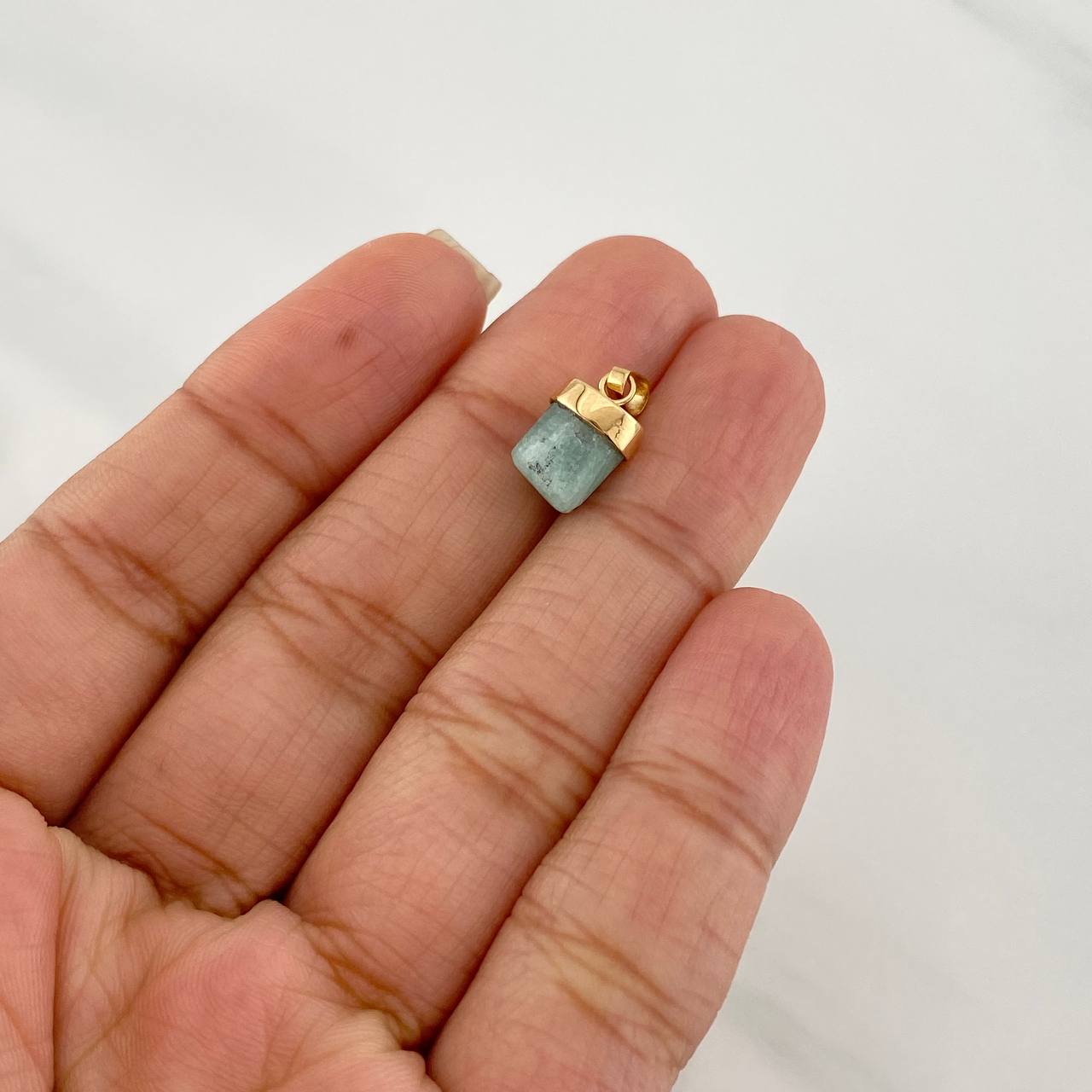 Dije Morralla Esmeralda 0.4g / 1.05cm Oro Amarillo 18K