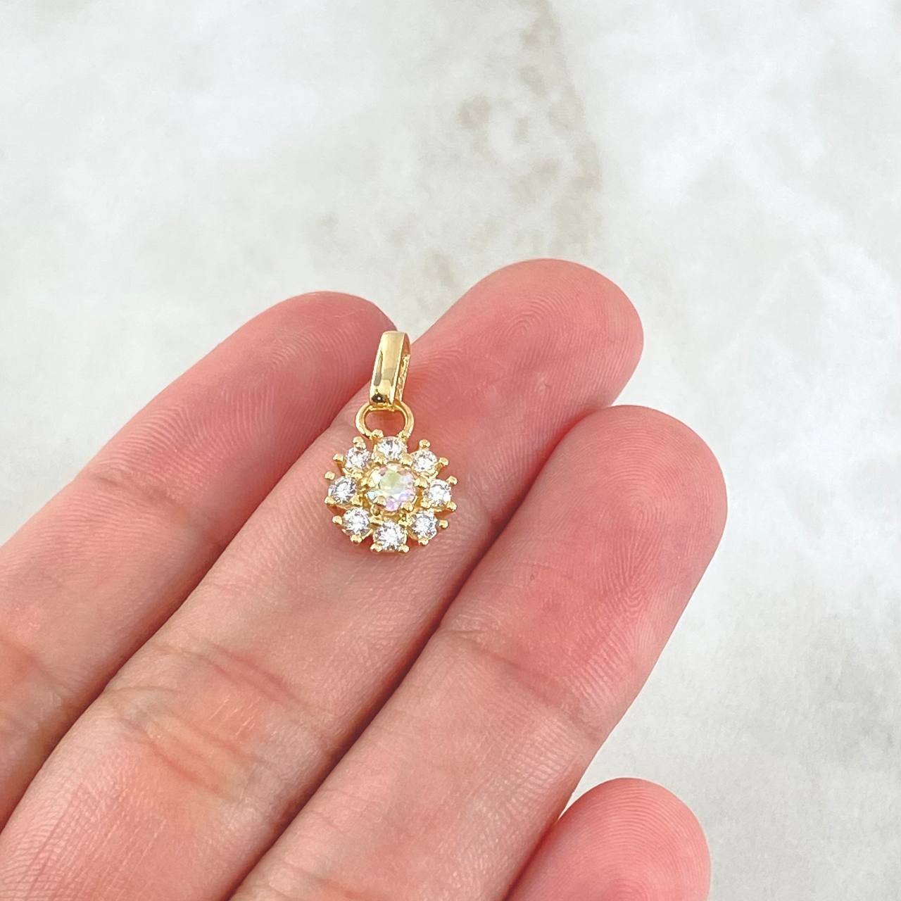 Dije Flor del Sol 1.75gr / 1.8cm / Nac.Esp. Oro 18K ©