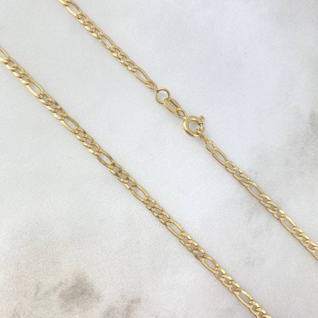 Cadena Figaro 6.35gr / 60cm / 3mm Oro Amarillo +1 18K ©