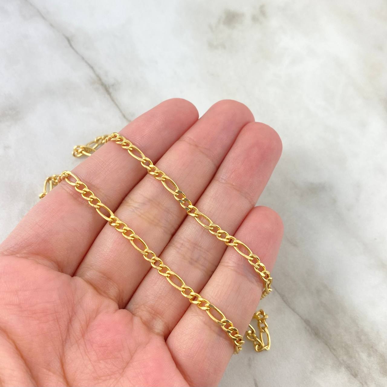 Cadena Figaro 6.35gr / 60cm / 3mm Oro Amarillo +1 18K ©