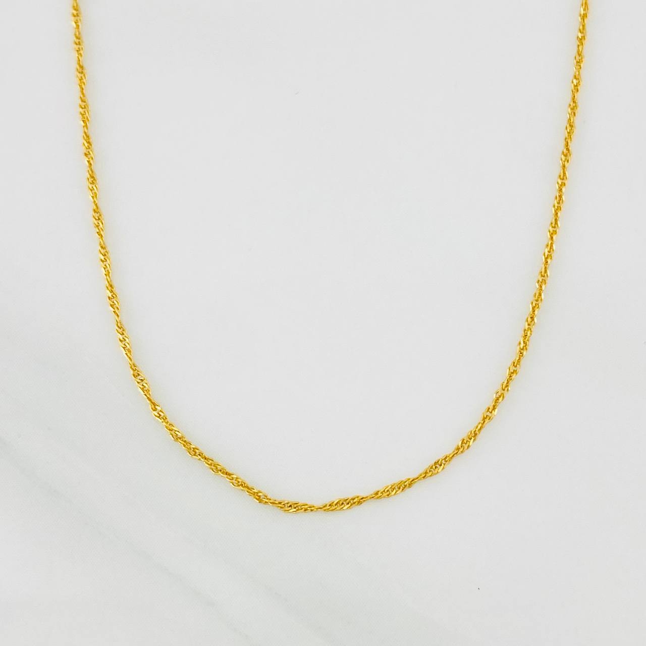 Cadena Singapur 0.9g / 40cm / 0.83mm Oro Amarillo 18K