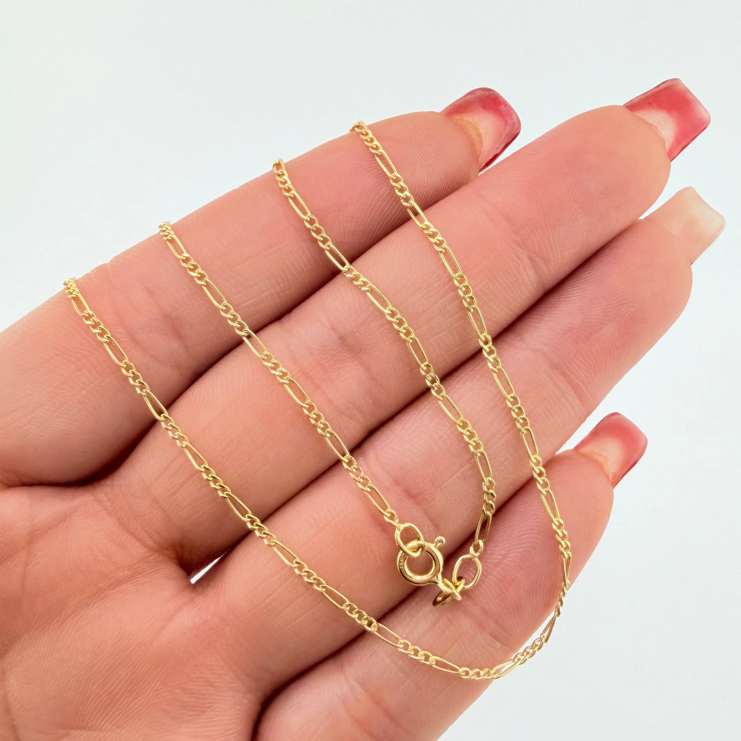 Cadena Figaro 1.35gr / 45cm / 1.5mm Oro Amarillo +1 18K ©