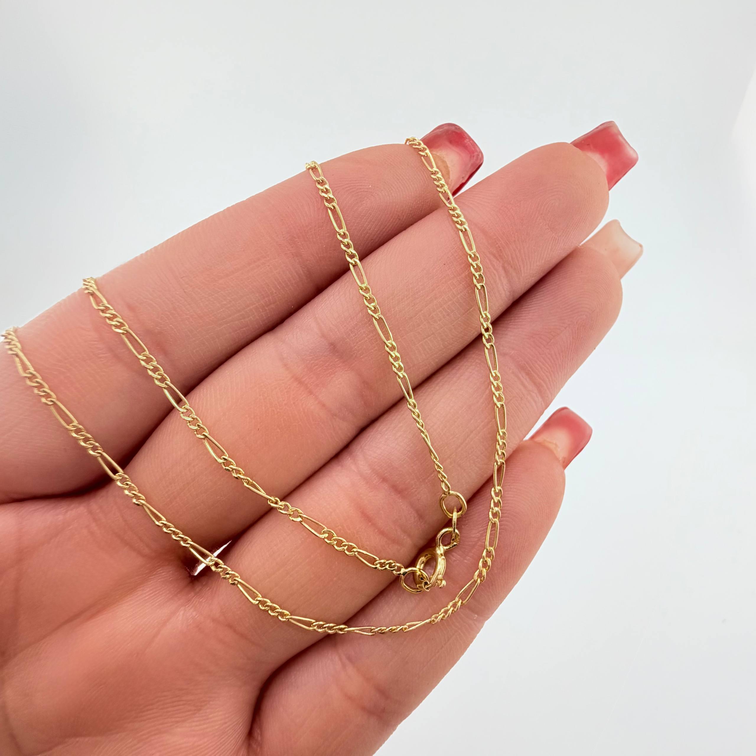 Cadena Figaro 1.75gr / 60cm / 1.5mm Oro Amarillo +1 18K ©