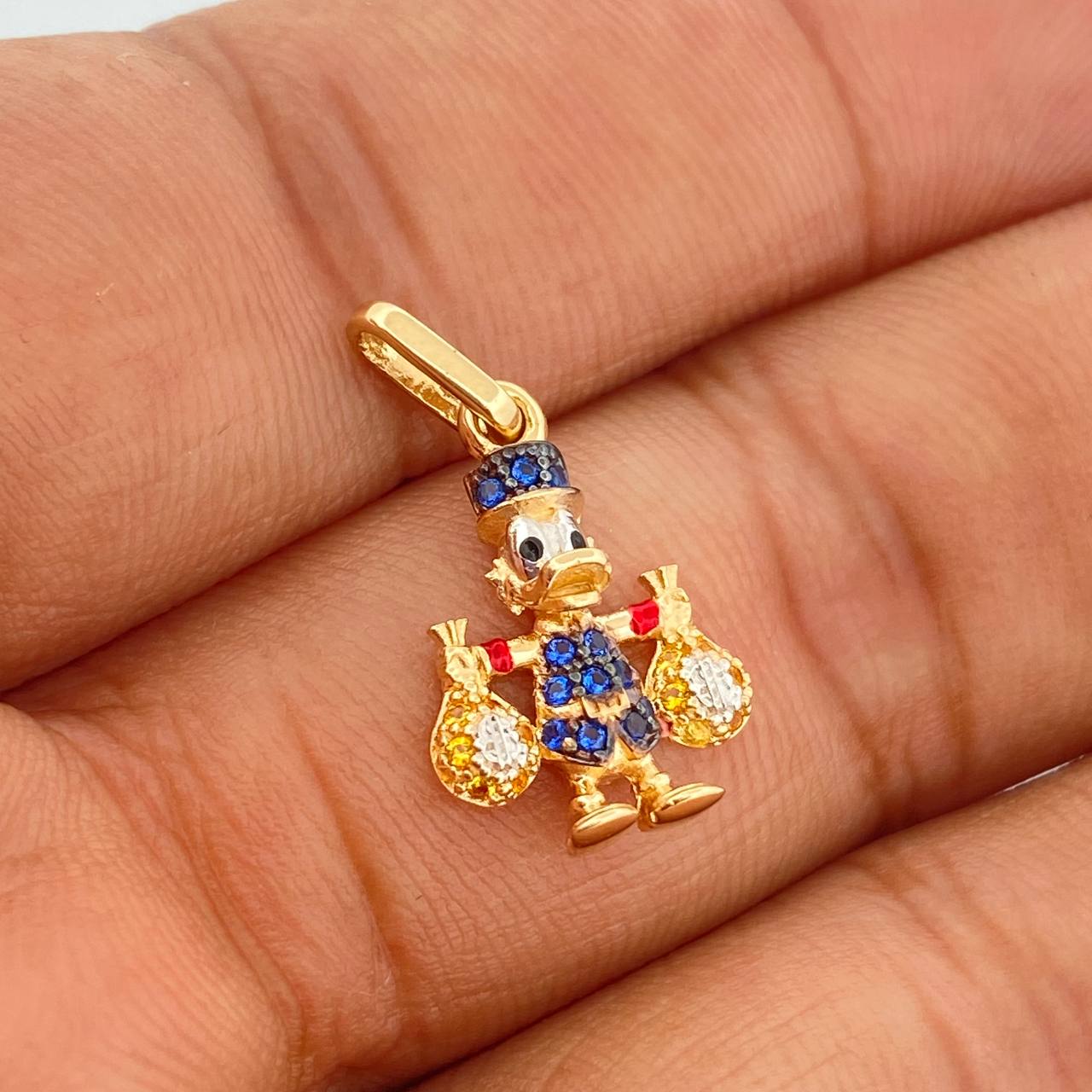 Dije Pato Bolsa Dinero 1.6gr / 2.2cm /  Tres Oros  18K %