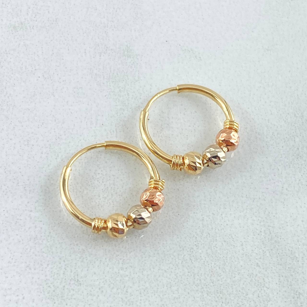 Candongas Trio 0.9gr / 1.3cm / Oro 18K *