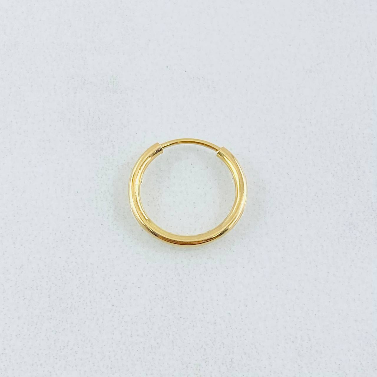 Piercing Aro Liso 0.25gr / 1.1cm / Oro Amarillo 18K