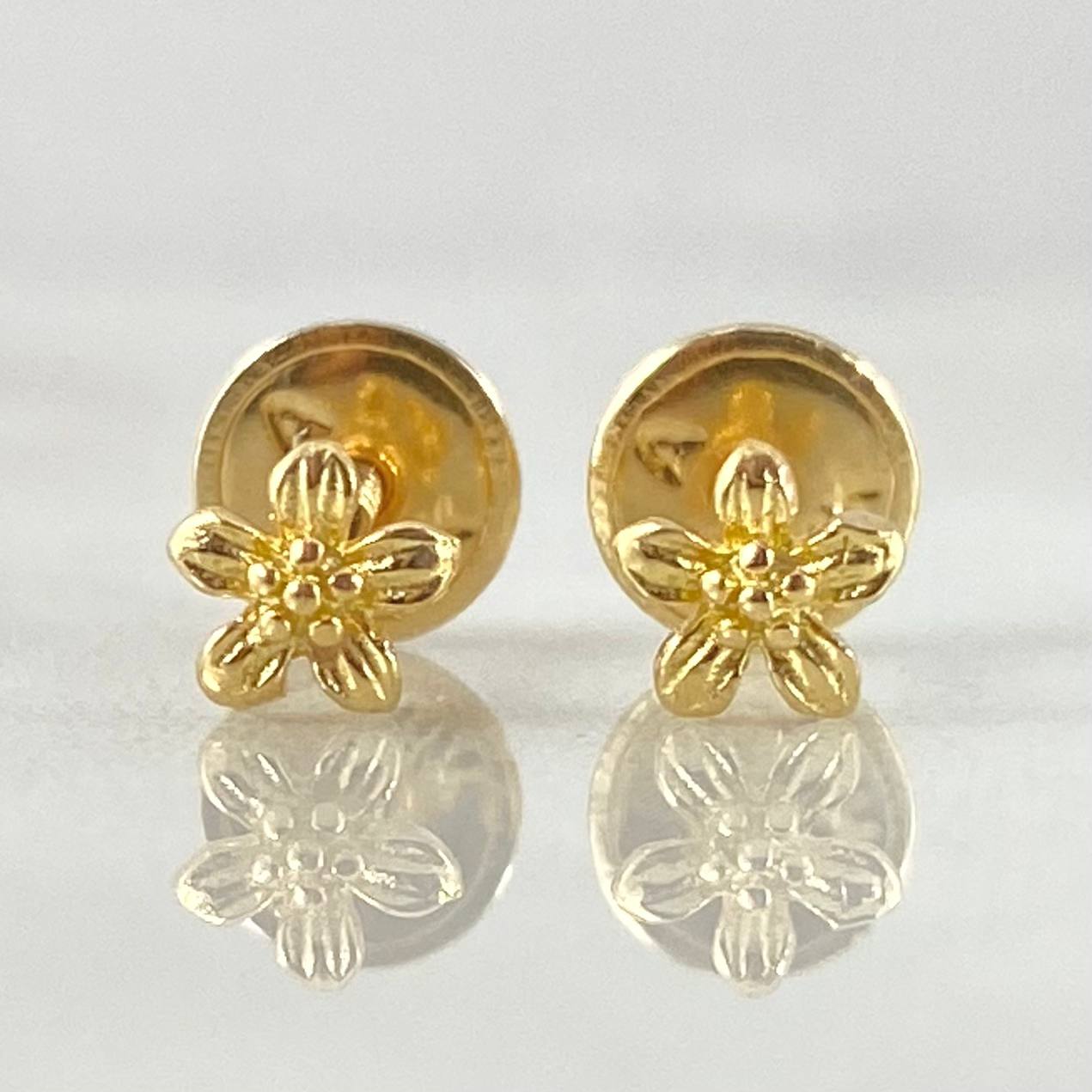 Topos Flor 0.65gr / Oro 18K ©