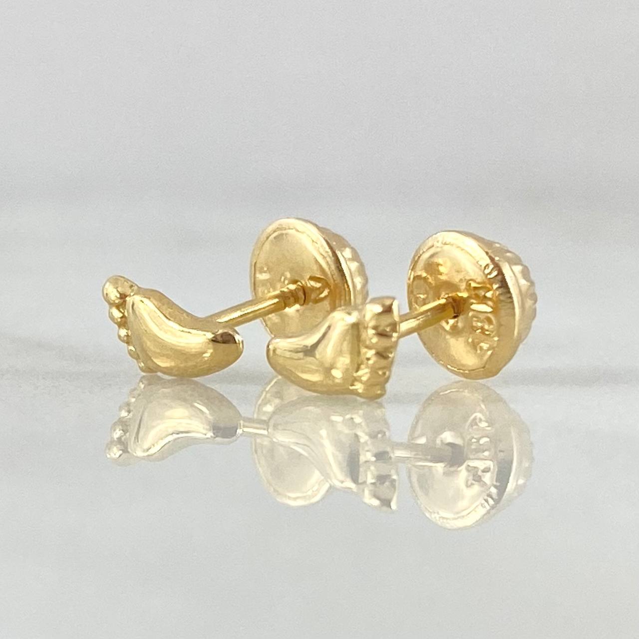 Topos Huella Pies 0.5gr / Oro 18K ©