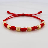 Pulsera Tejida Roja 7 Nudos 6 Cilindros Diamantados Oro Amarillo 18K
