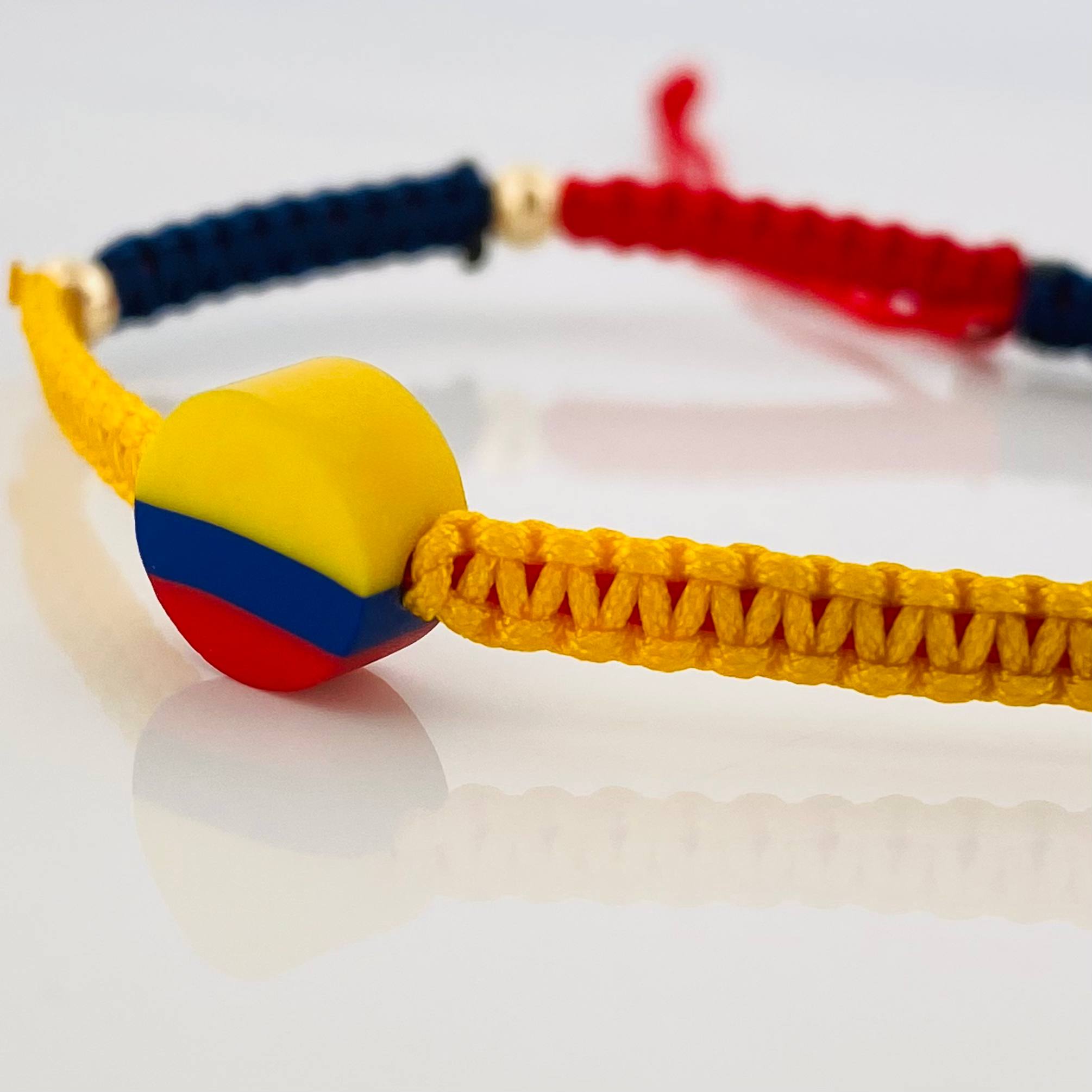 Pulsera Tejida Tricolor 4 Bolas Lisas Oro Amarillo 18K