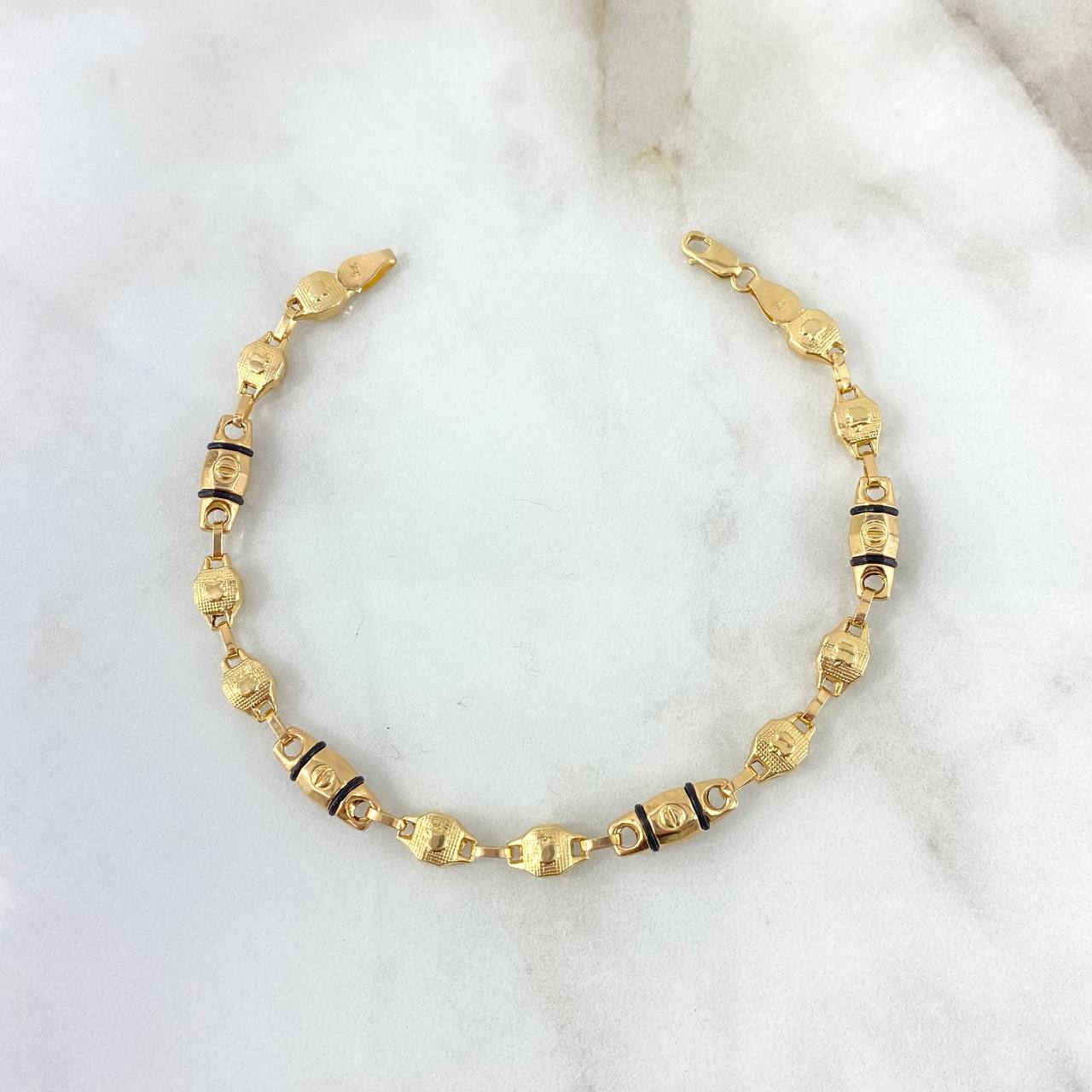 Pulso Rustico Tornillo Manzana 4.55gr / 19cm / Cauchos Negros Oro Amarillo ©