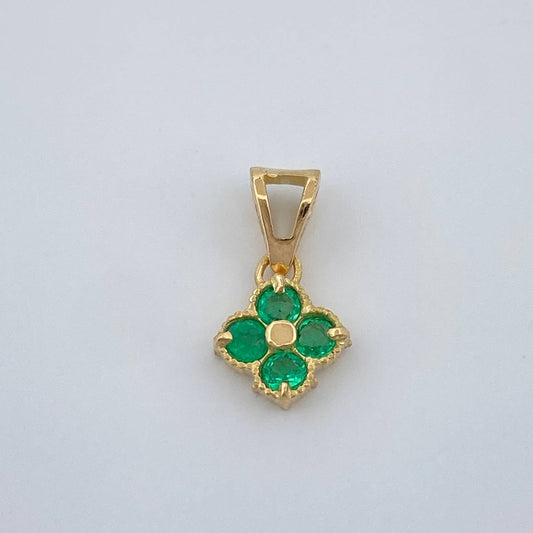 Dije Flor Esmeraldas 0.65gr / 1.2cm / Oro Amarillo 18K %