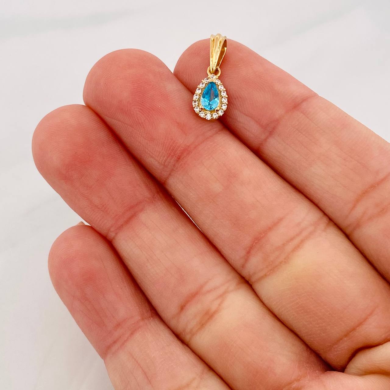 Dije Halo Gota 0.7g / 1.5cm Oro Amarillo 18K