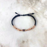 Pulsera Negra Retazo Rustico 2.6gr / 6mm-5mm Bolas Diamantadas 6 und Oro Rosa *