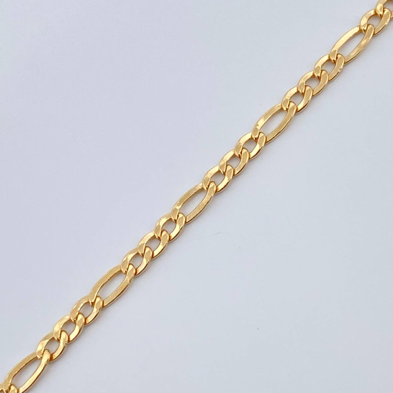 Pulso Figaro 1.45gr / 19.2cm / 2.36mm Oro Amarillo +1 18K %