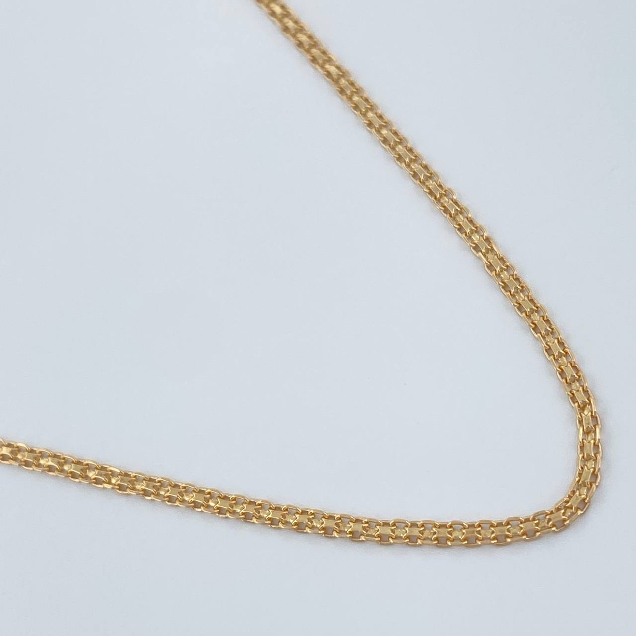 Cadena China 2.1gr / 39.7cm / 1.46mm Oro Amarillo +1 18K %