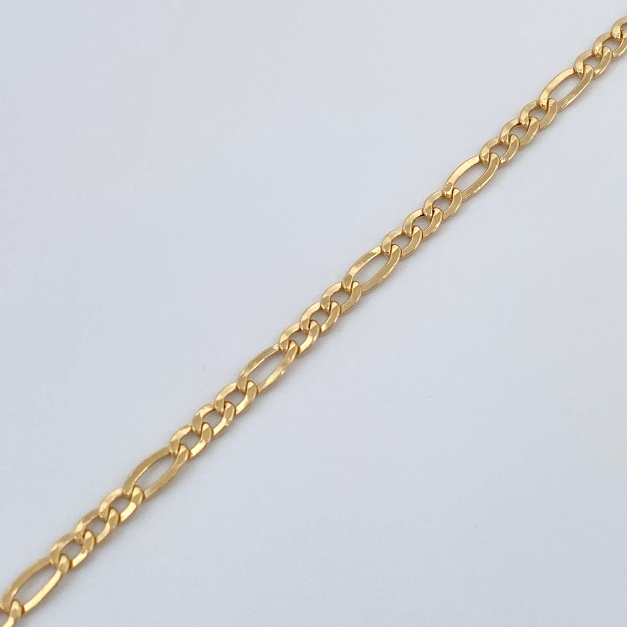 Pulso Figaro 1.4gr / 19cm / 2.2mm Oro Amarillo +1 18K &