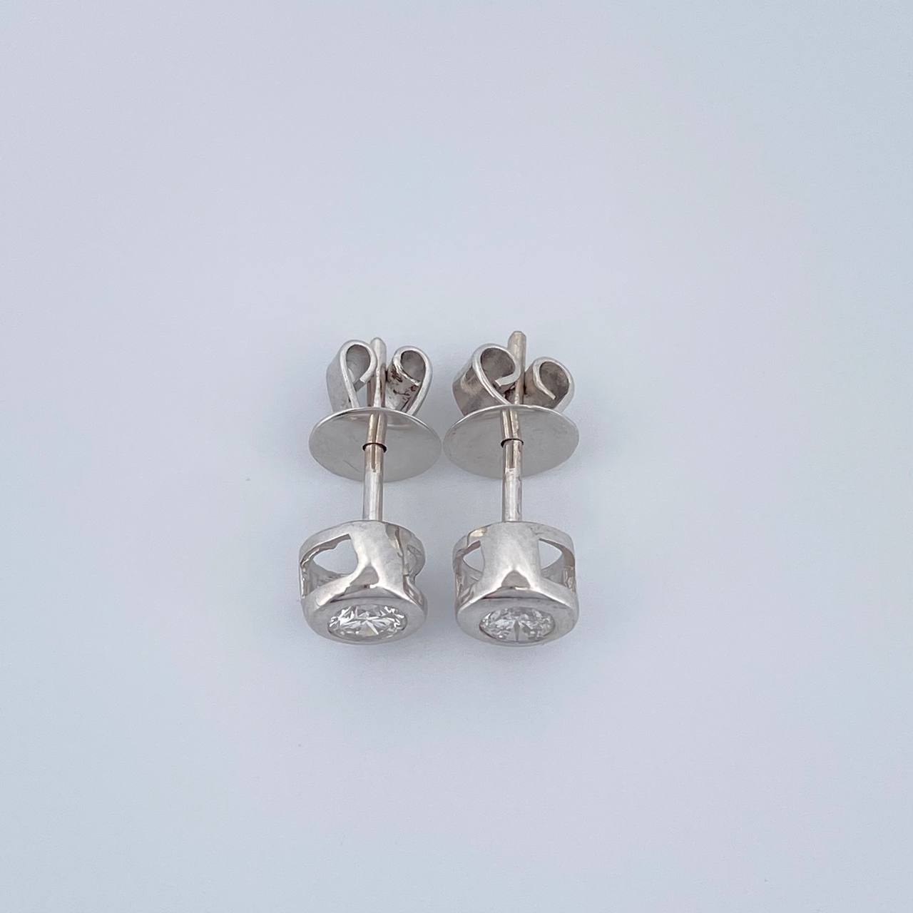 Topos Bisel Diamantes 1.45gr / 5.11mm Oro Blanco 18K %