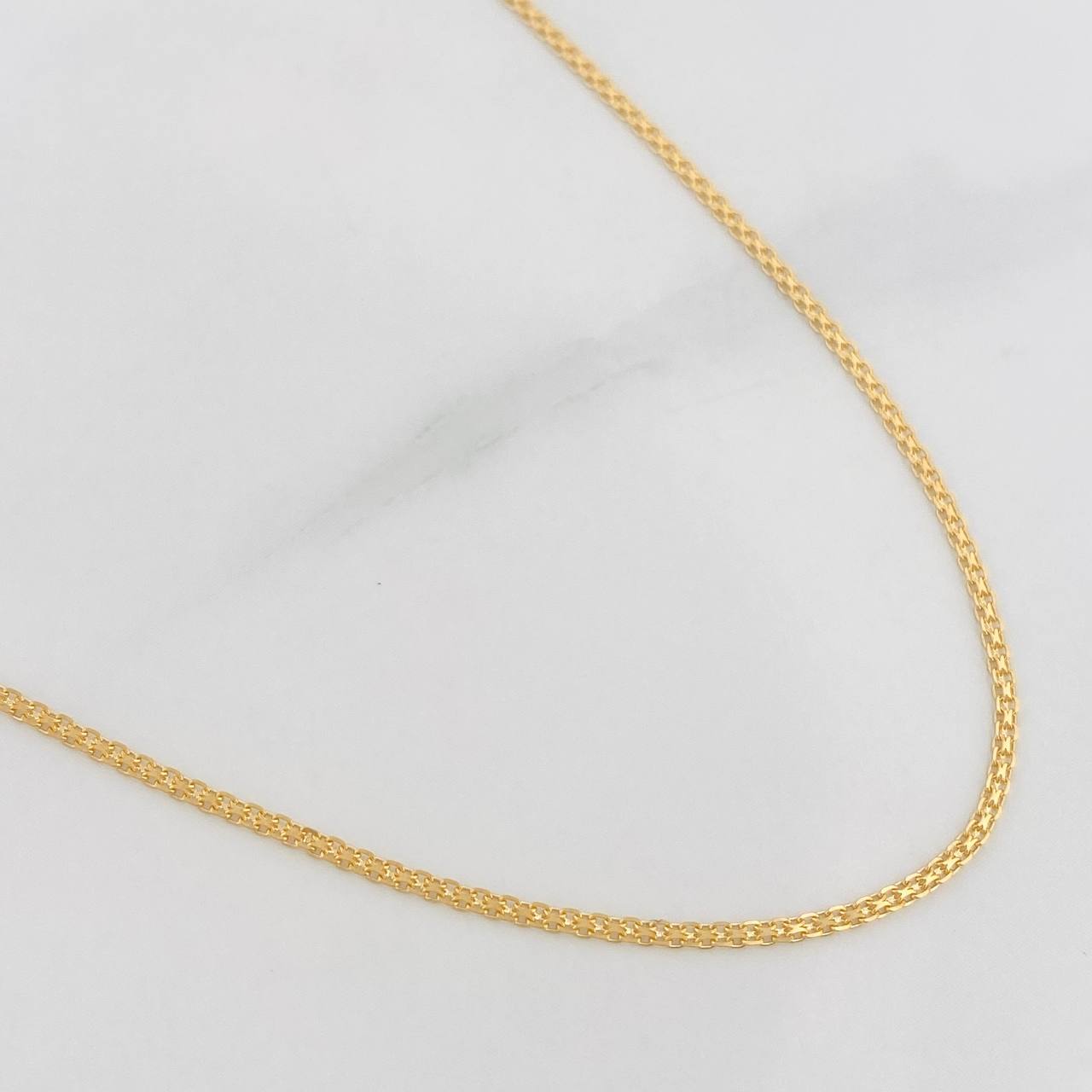 Cadena China 2.3g / 60cm / 1.1mm Oro Amarillo 18K