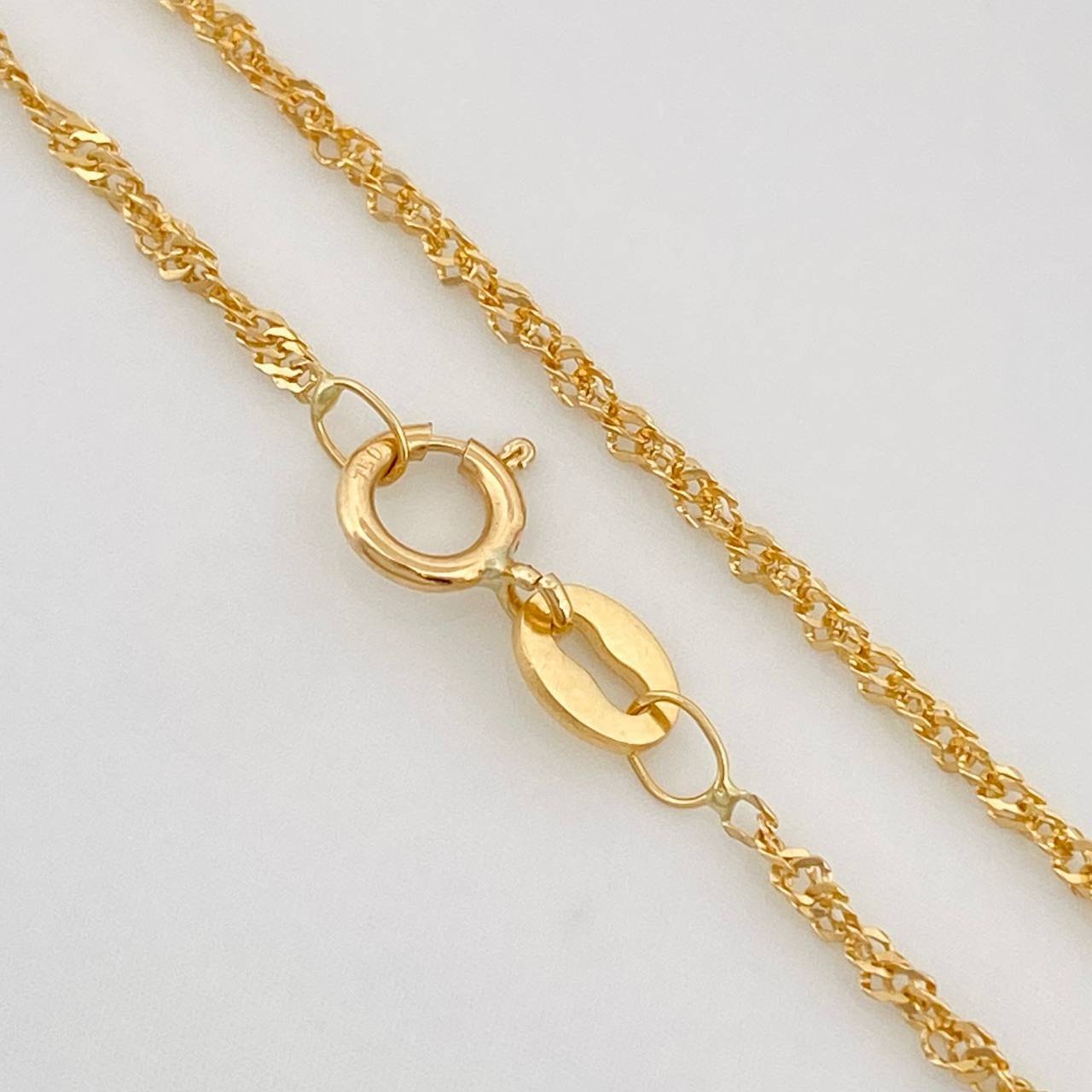Cadena Singapur 1.4g / 45cm / 1.1mm Oro Amarillo 18K