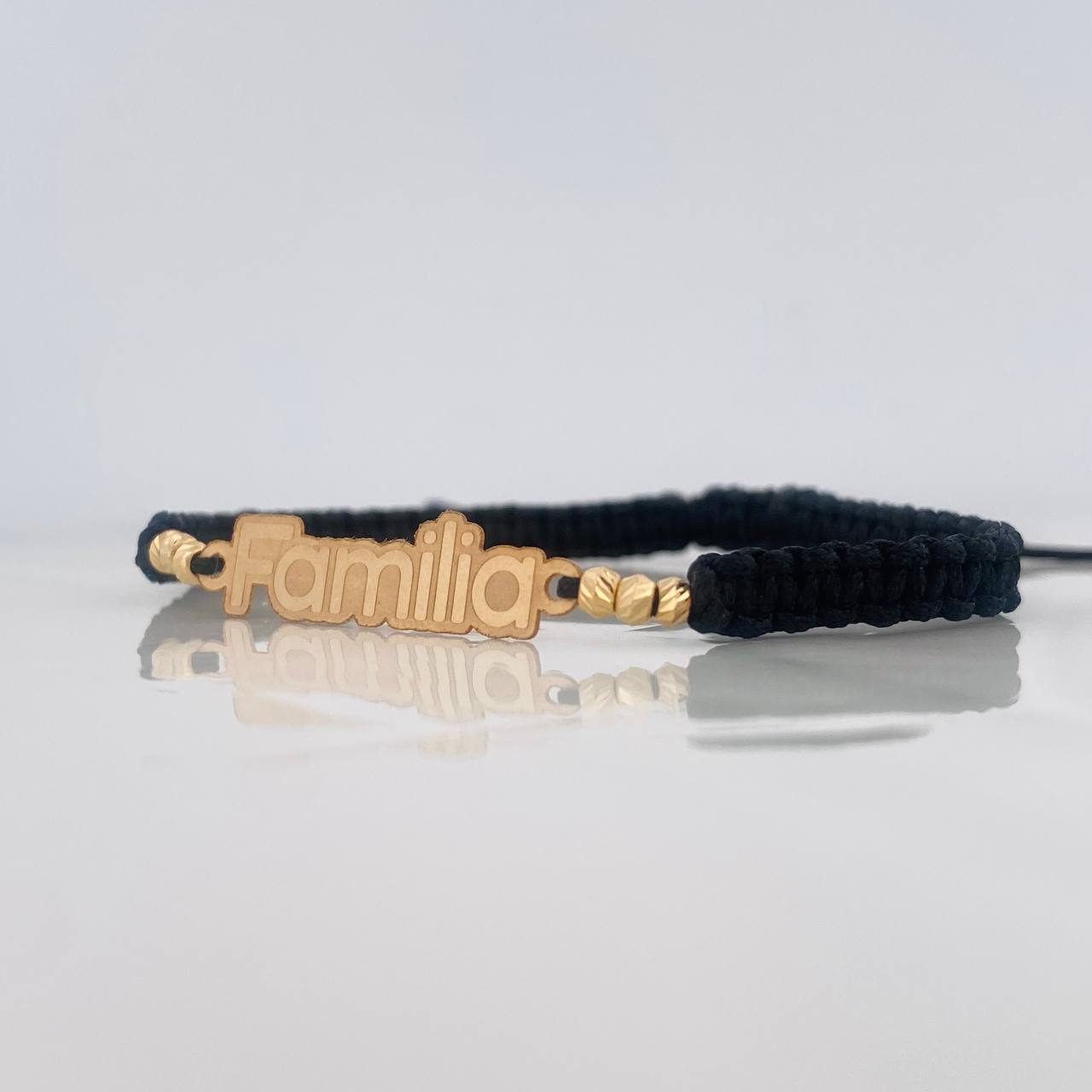 Pulsera Tejida Negra Familia Oro Amarillo 18K