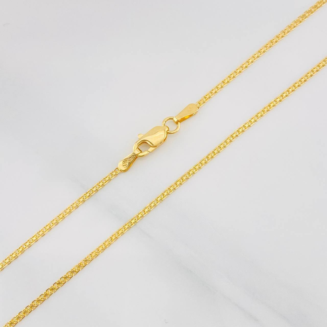Cadena China 2.35g / 60cm / 1.22mm Oro Amarillo 18K
