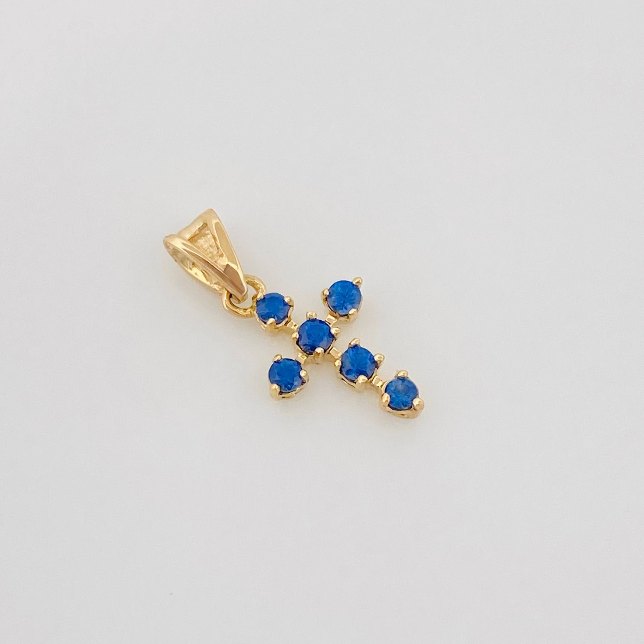 Dije Cruz Zafiro 18Pts 0.4 g / 1.03 cm Oro Amarillo 18K