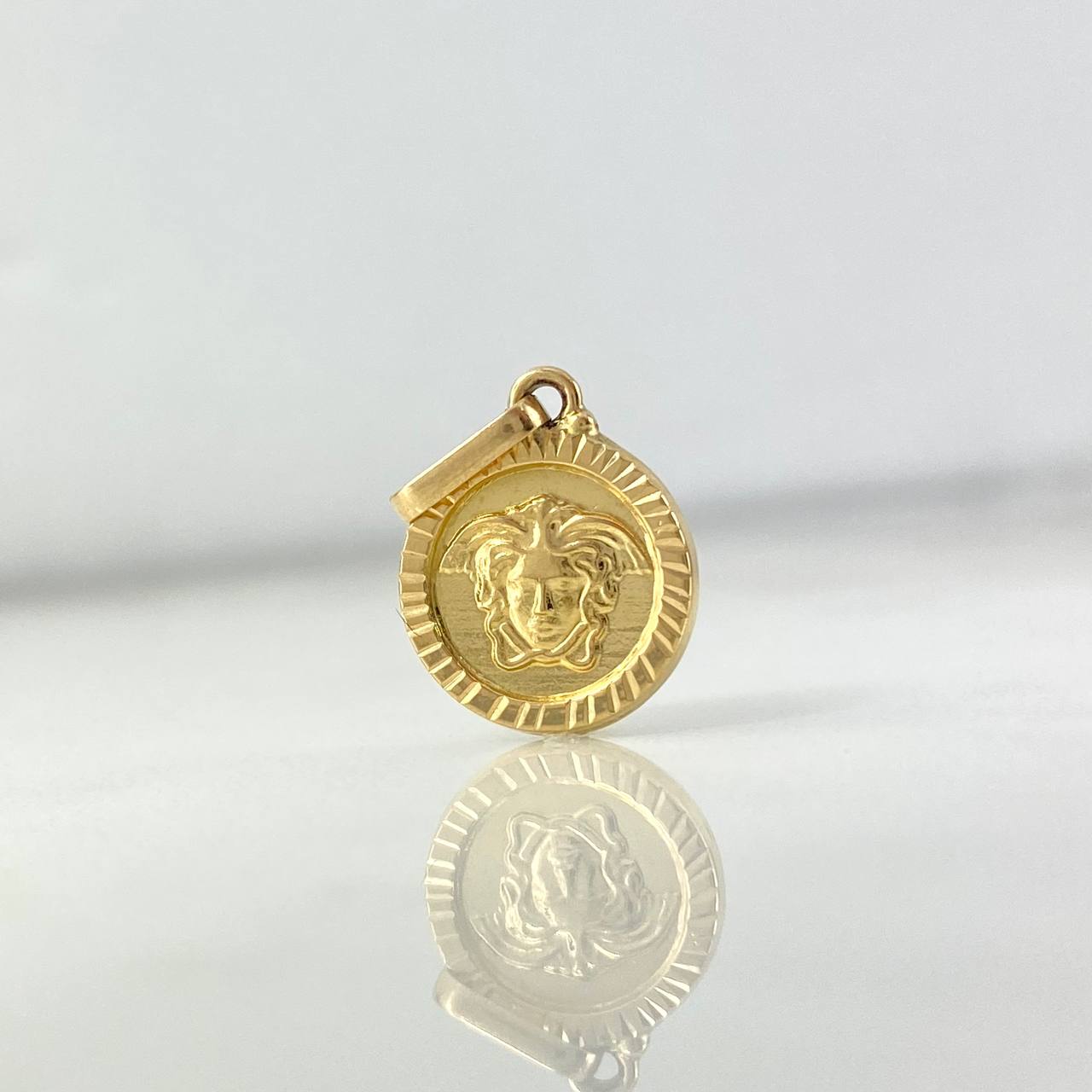 Dije Medusa 0.95gr / 2cm / Troquelado Oro Amarillo *