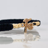 Pulsera Tejida Negra Fe Bolas Diamantadas Oro Amarillo 18K
