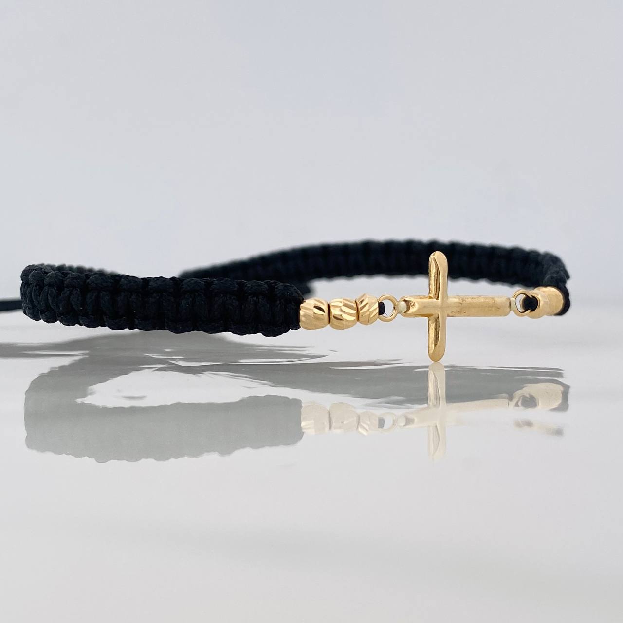 Pulsera Tejida Negra Cruz Oro Amarillo 18K