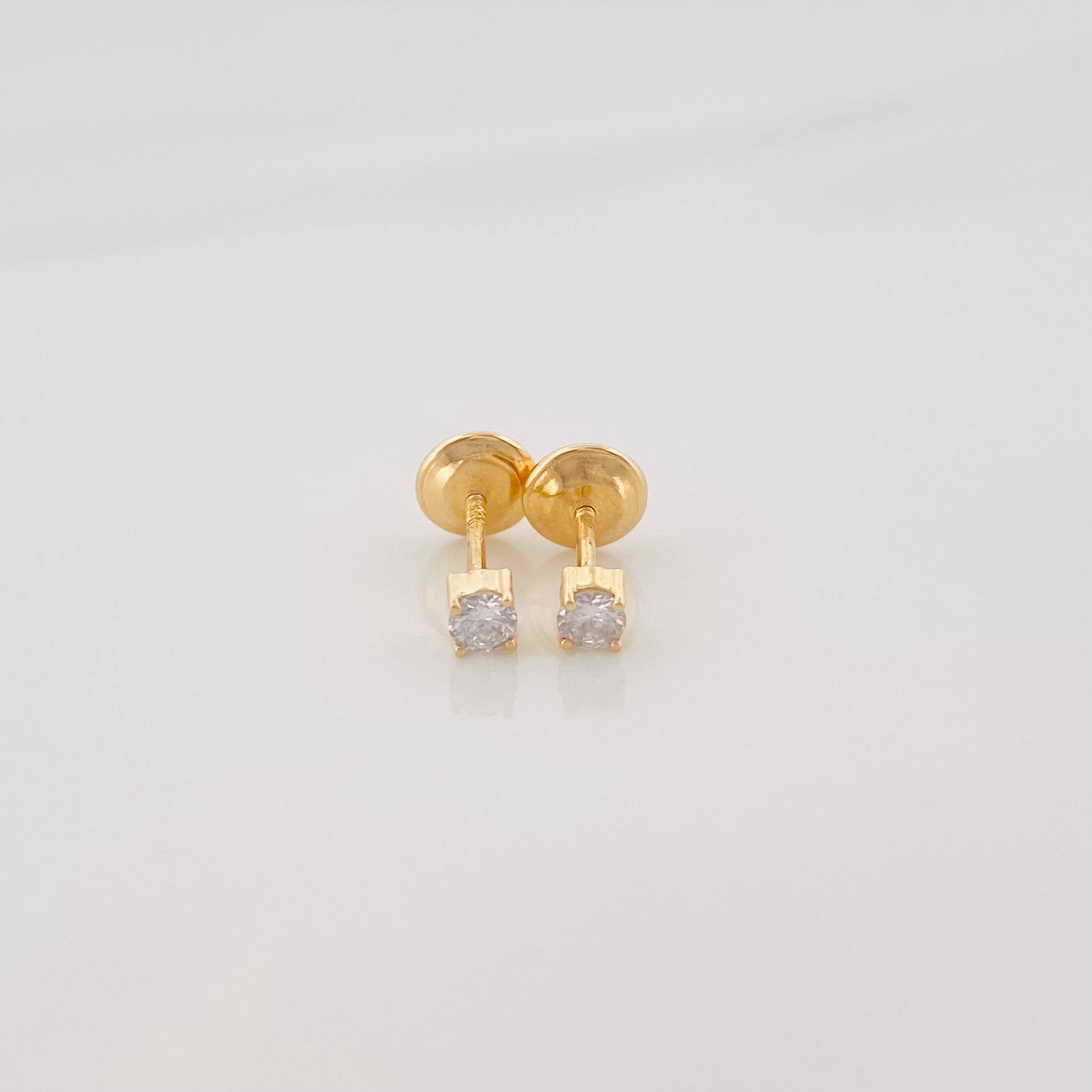 Topos Cuatro Garras Diamante 0.7Pts 0.5 g / 2 mm Oro Amarillo 18K