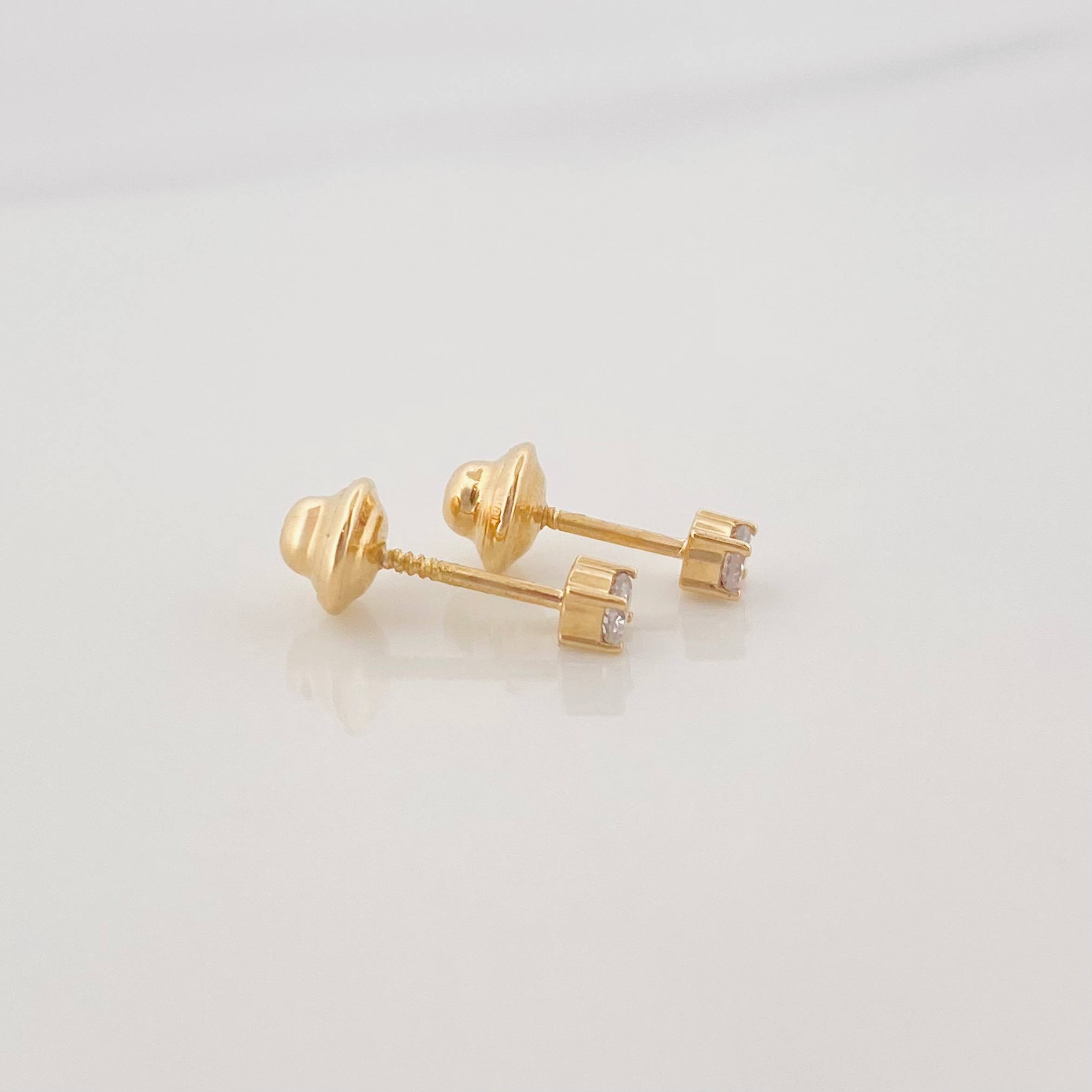 Topos Cuatro Garras Diamante 0.7Pts 0.5 g / 2 mm Oro Amarillo 18K