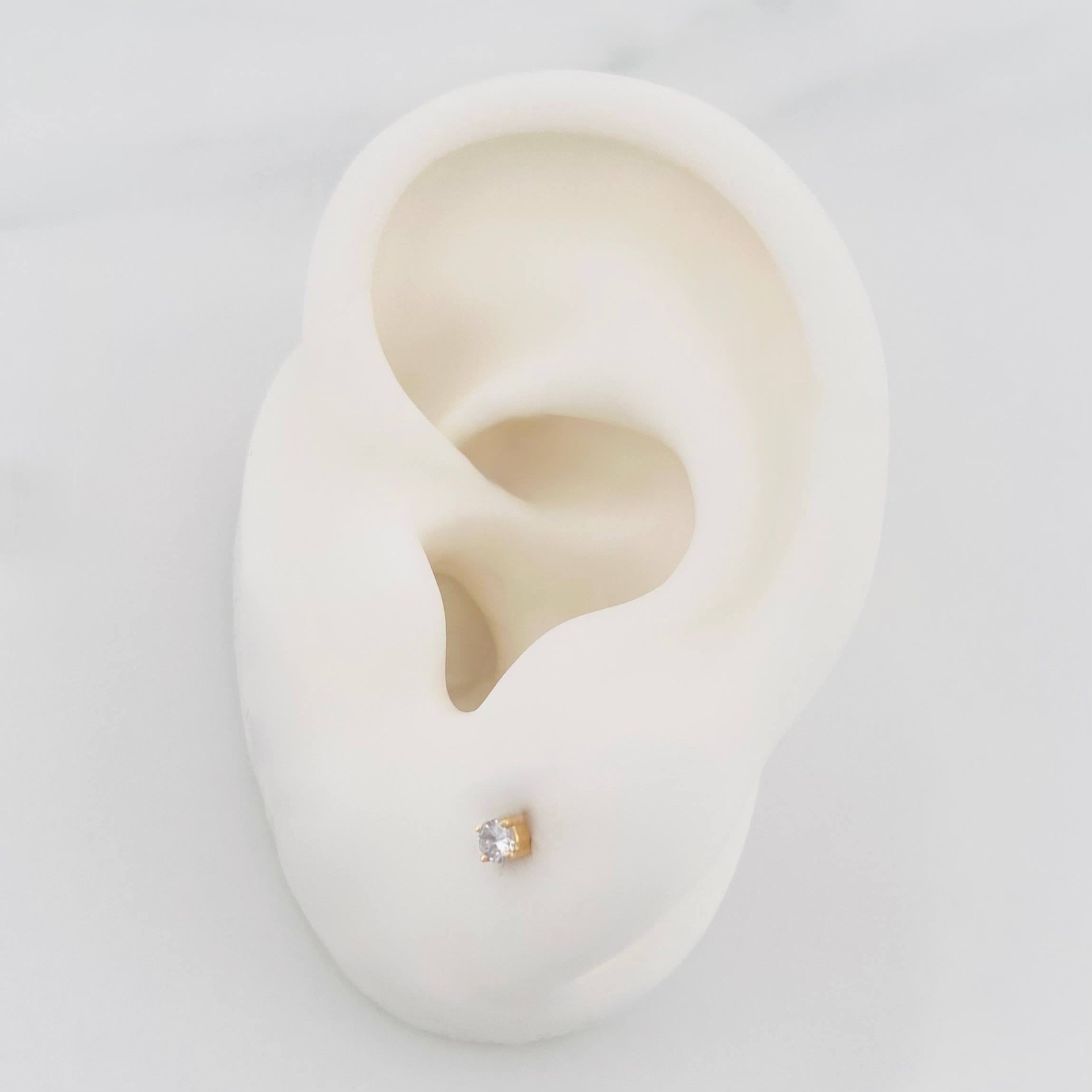 Topos Cuatro Garras Diamante 0.7Pts 0.5 g / 2 mm Oro Amarillo 18K