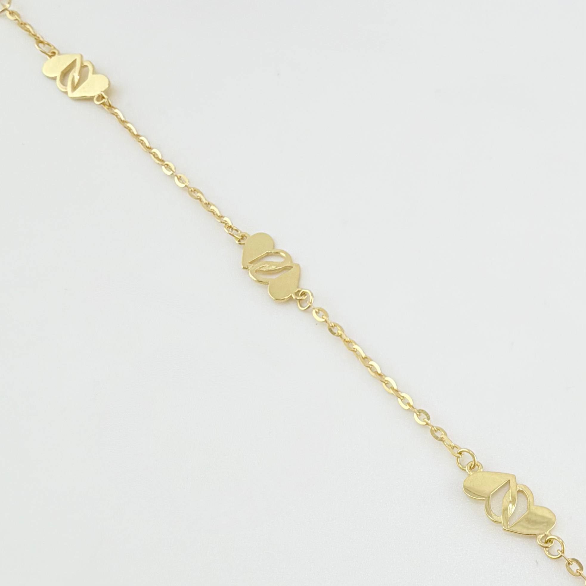 Pulso Aro Seguido Corazones Cruzados 1.95gr / 19cm / 1.2mm Oro Amarillo +4 18K ©