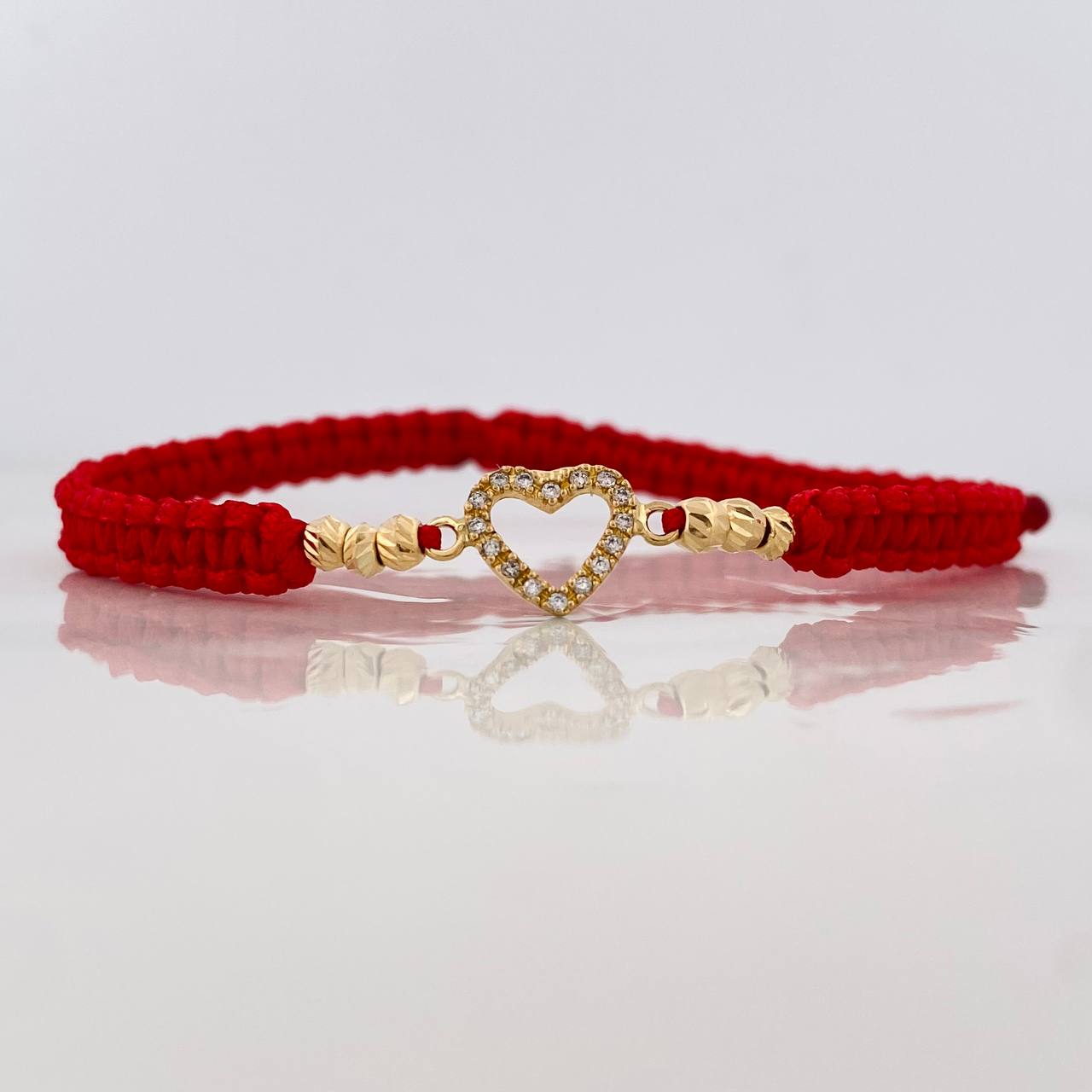 Pulsera Tejida Roja Silueta Corazón Oro Amarillo 18K
