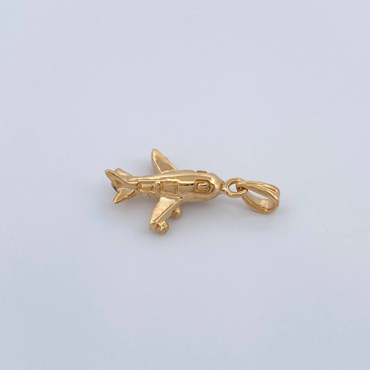 Dije Avion 1.6gr / 2.2cm / Oro Amarillo 18K %