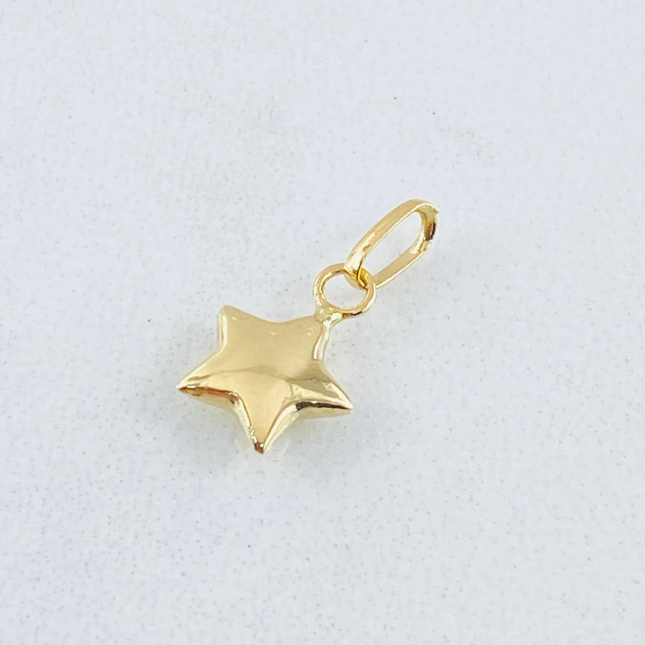 Dije Estrella 0.25gr / 1.3cm / Oro Amarillo 18K