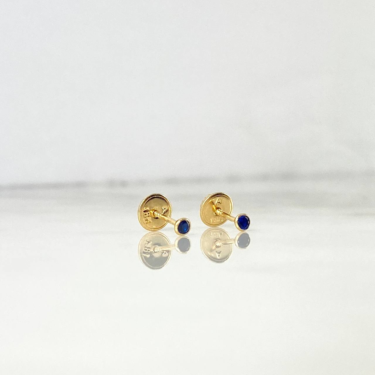 Topos Bisel 0.4gr / Circon Azul Oro Amarillo