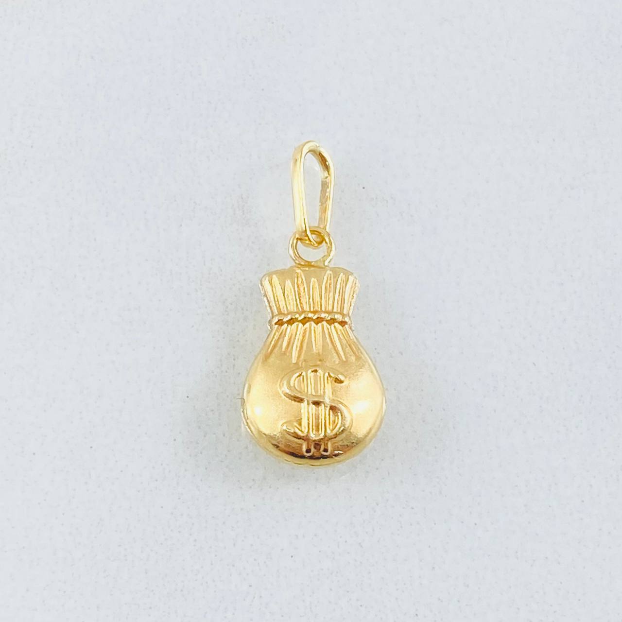Dije Bolsa Dinero 0.5gr / 1.9cm / Oro Amarillo 18K ©