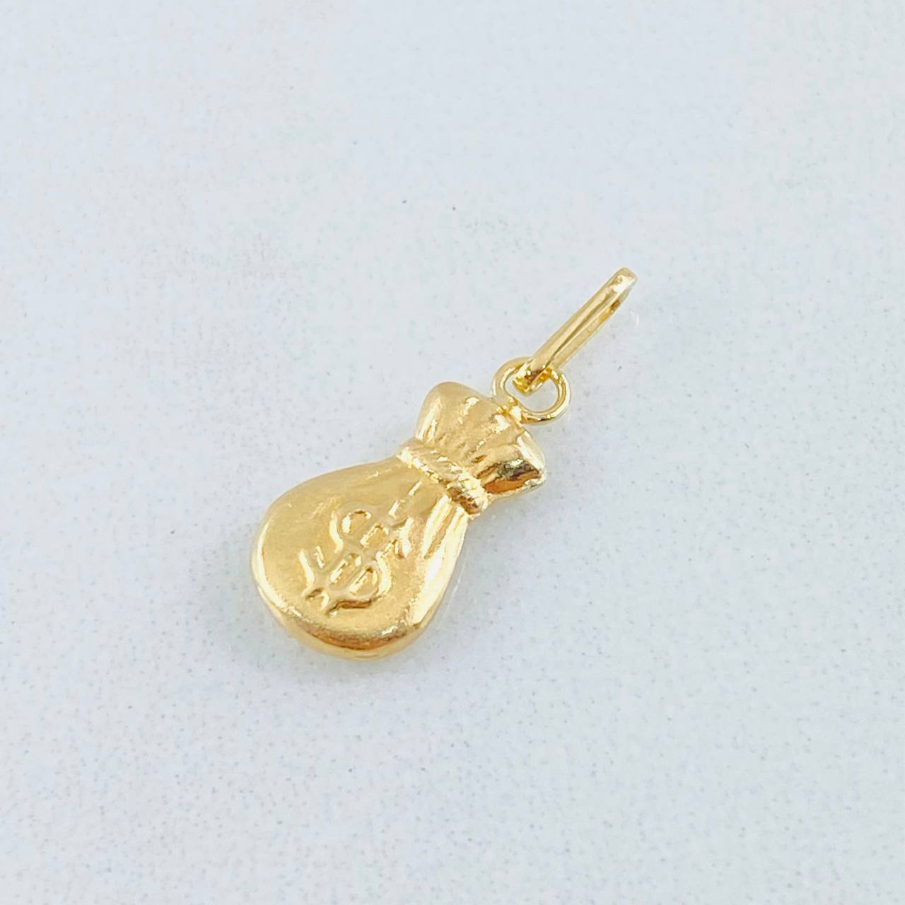 Dije Bolsa Dinero 0.35gr / 1.8cm / Oro Amarillo 18K ©