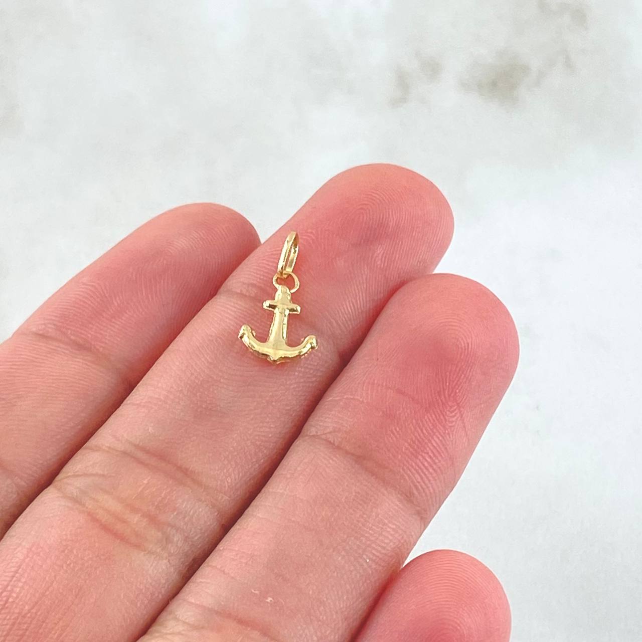 Dije Ancla 0.3gr / 1.4cm / Oro Amarillo 18K