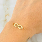 Herraje Infinito 0.65gr / 2.3cm / Oro Amarillo 18K ©