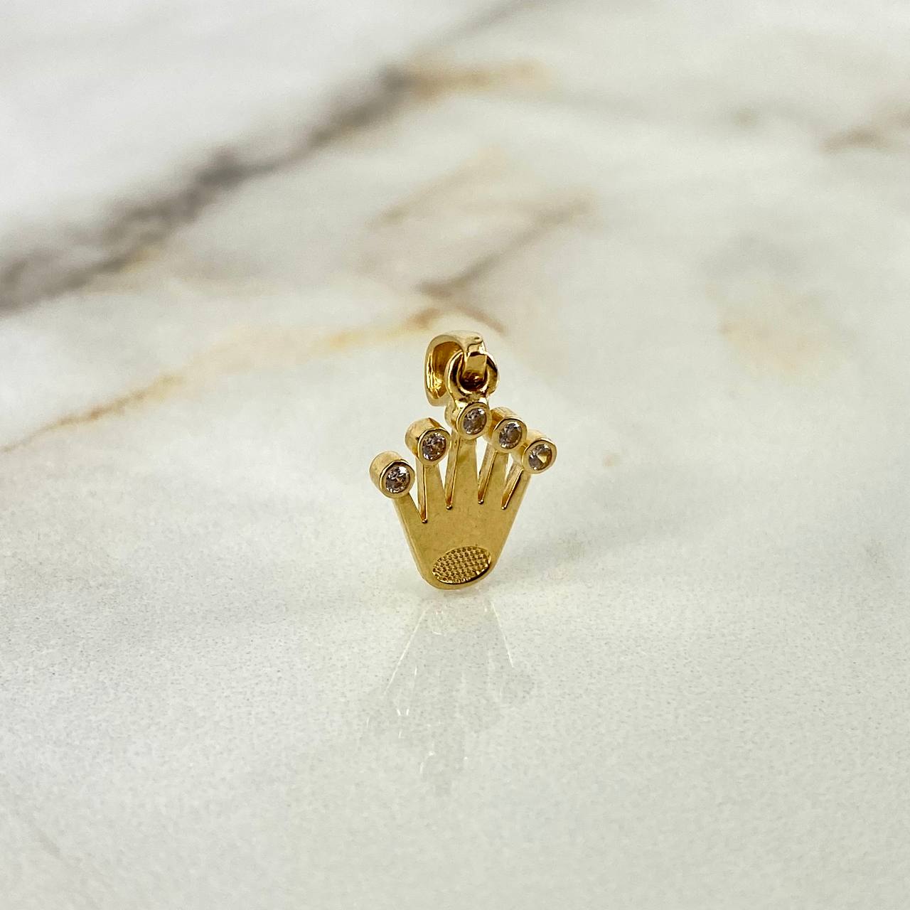 Dije Corona RX 1.1gr / 2cm / Oro Amarillo ©