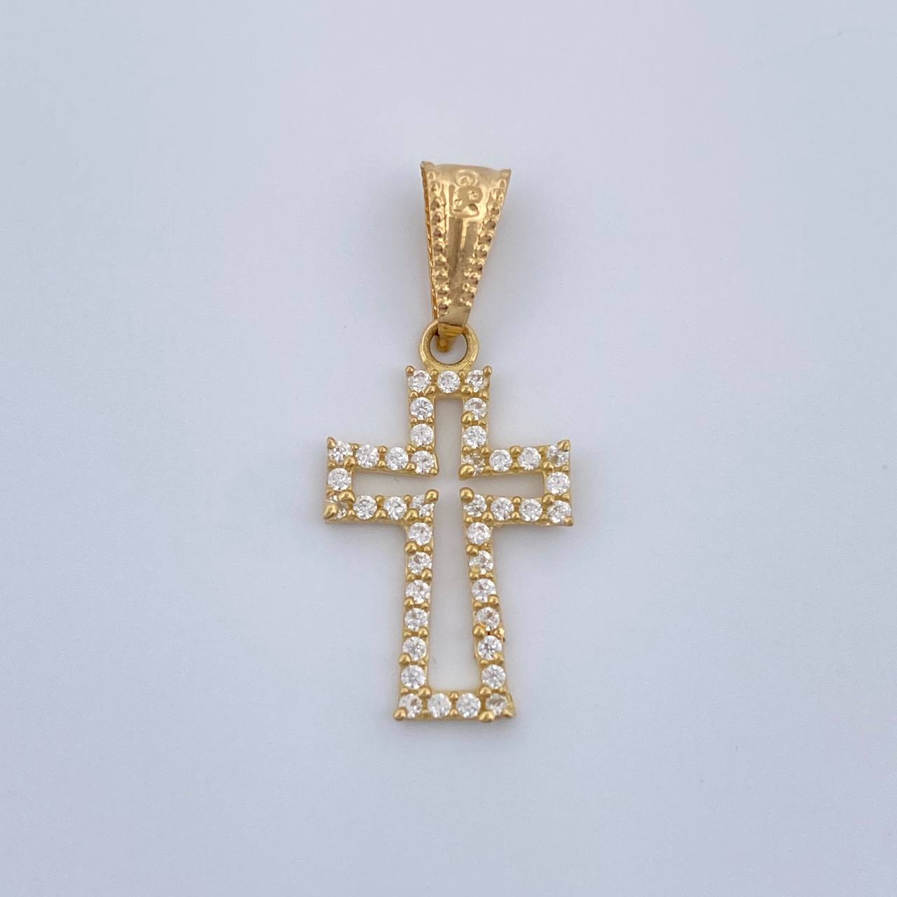 Dije Cruz 0.65gr / 2.4cm / Oro Amarillo 18K %