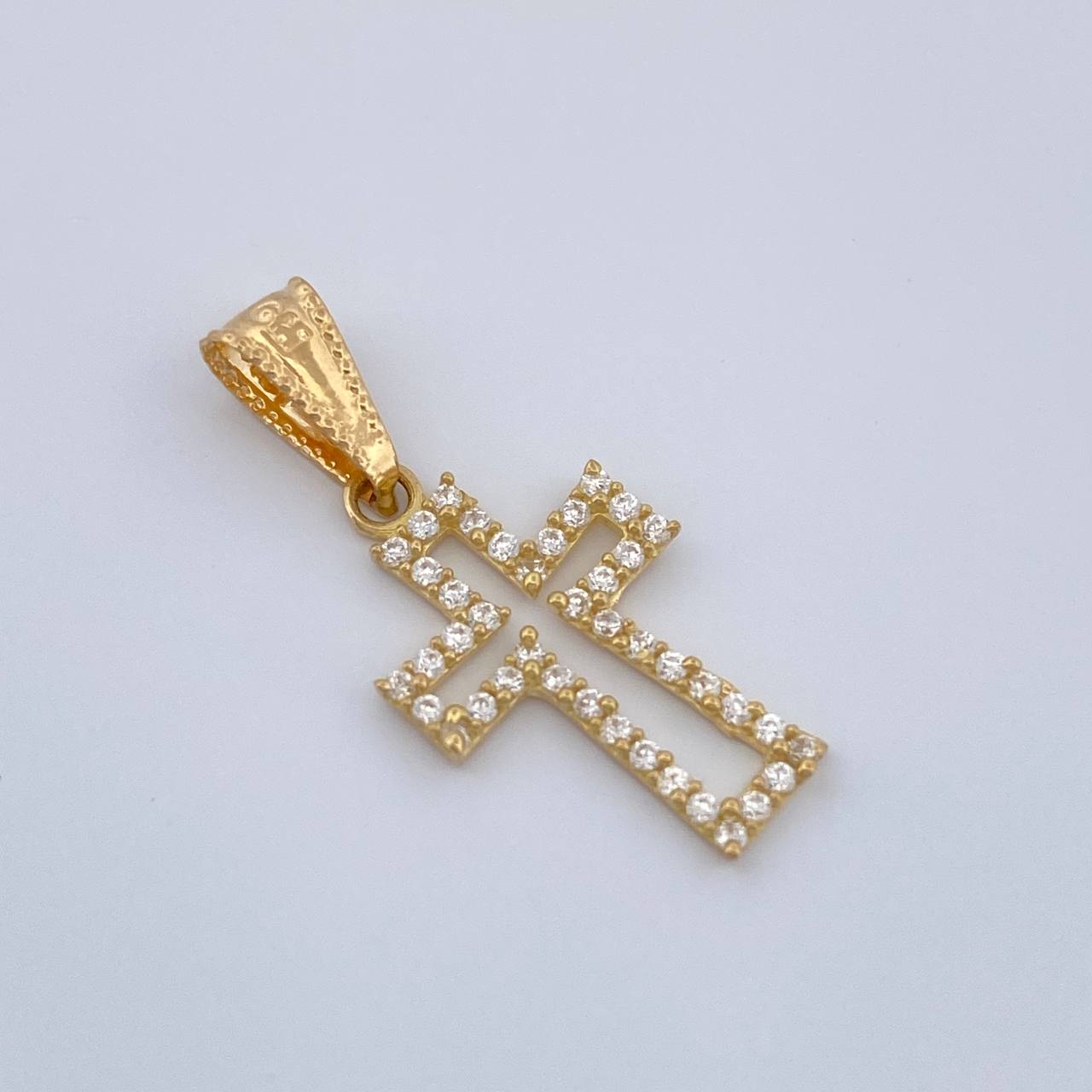 Dije Cruz 0.65gr / 2.4cm / Oro Amarillo 18K %